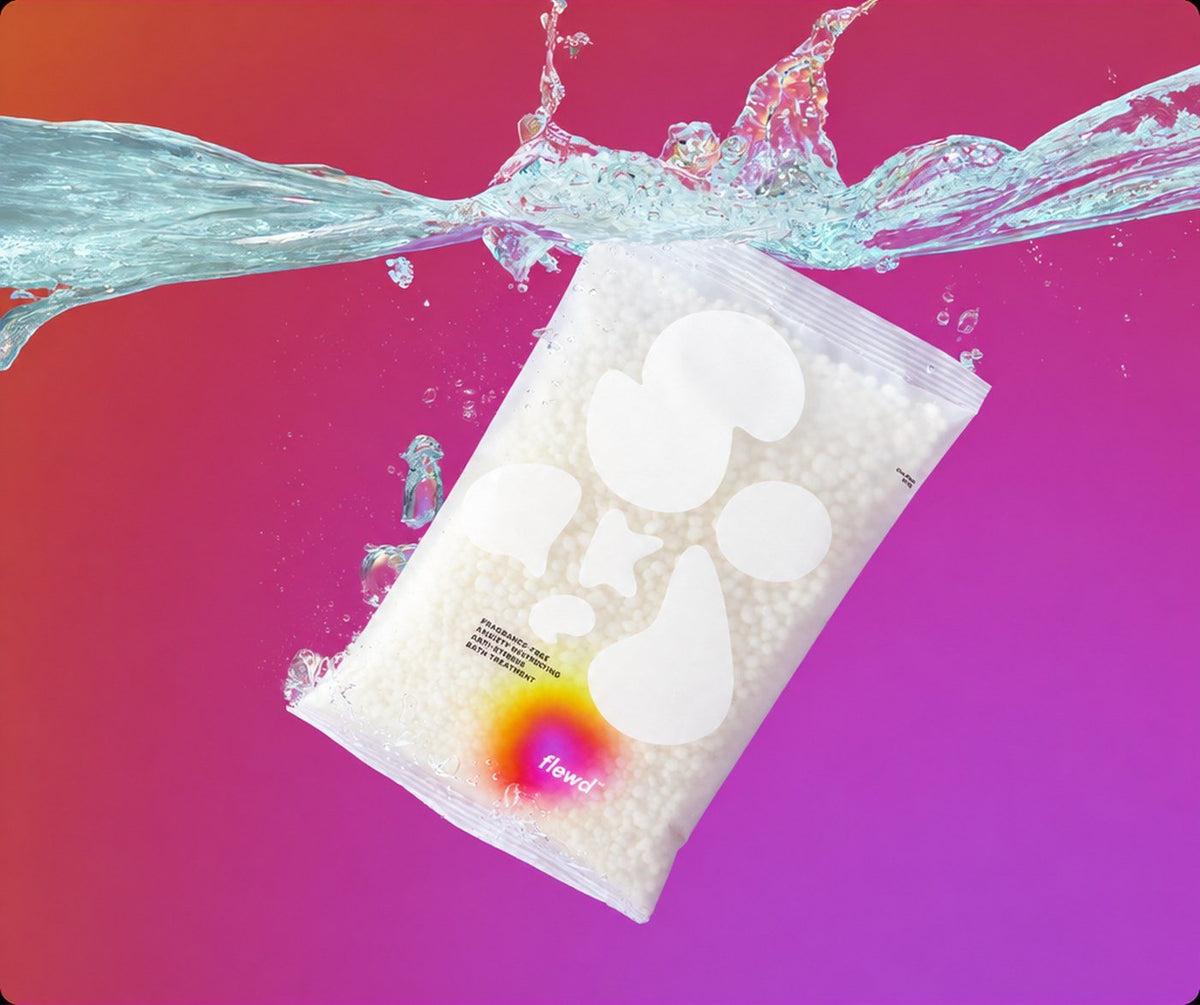 Flewd fragrance-free Anxiety Destroying anxiety bath soak clear pouch splashing into water