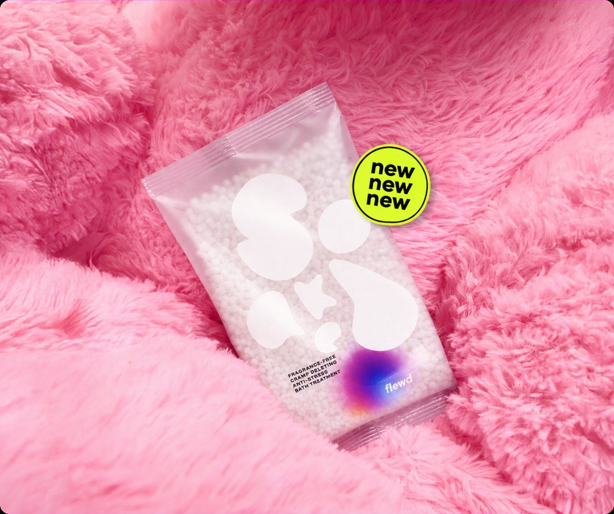 Flewd fragrance-free Cramp Deleting magnesium bath soak clear pouch on pink faux fur with a "new" sticker