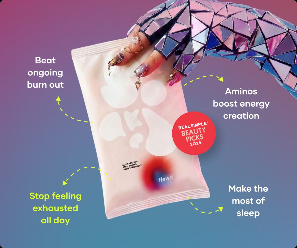 Flewd Ache Erasing bath soak pouch held by a mirrored glove, for achy days