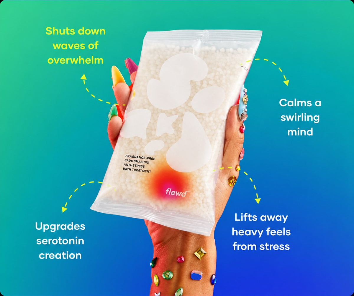 Fragrance-free Sads Smashing pouch in a hand with jeweled nails, part of the Flewd Nootropic Trio