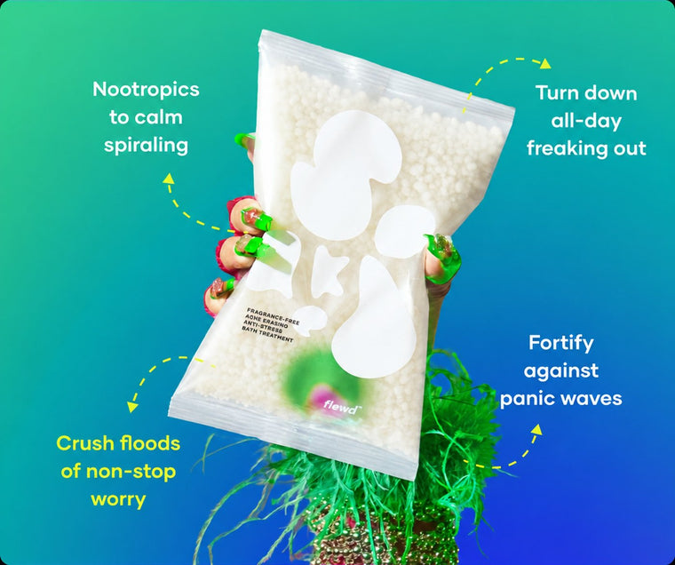 Fragrance-free Panic Crushing pouch in a green-painted hand, part of the Flewd Nootropic Trio